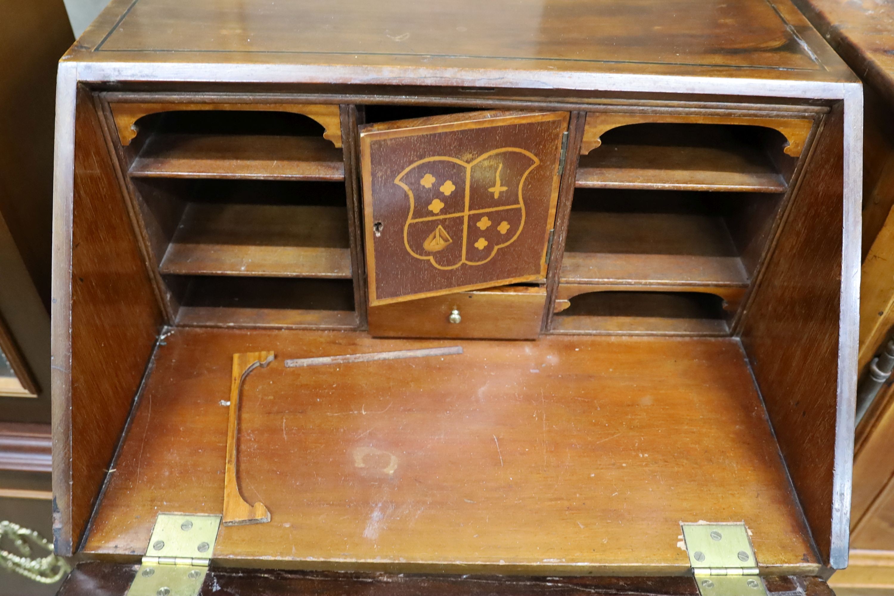 An Edwardian marquetry inlaid mahogany bureau, width 61cm, depth 46cm, height 99cm